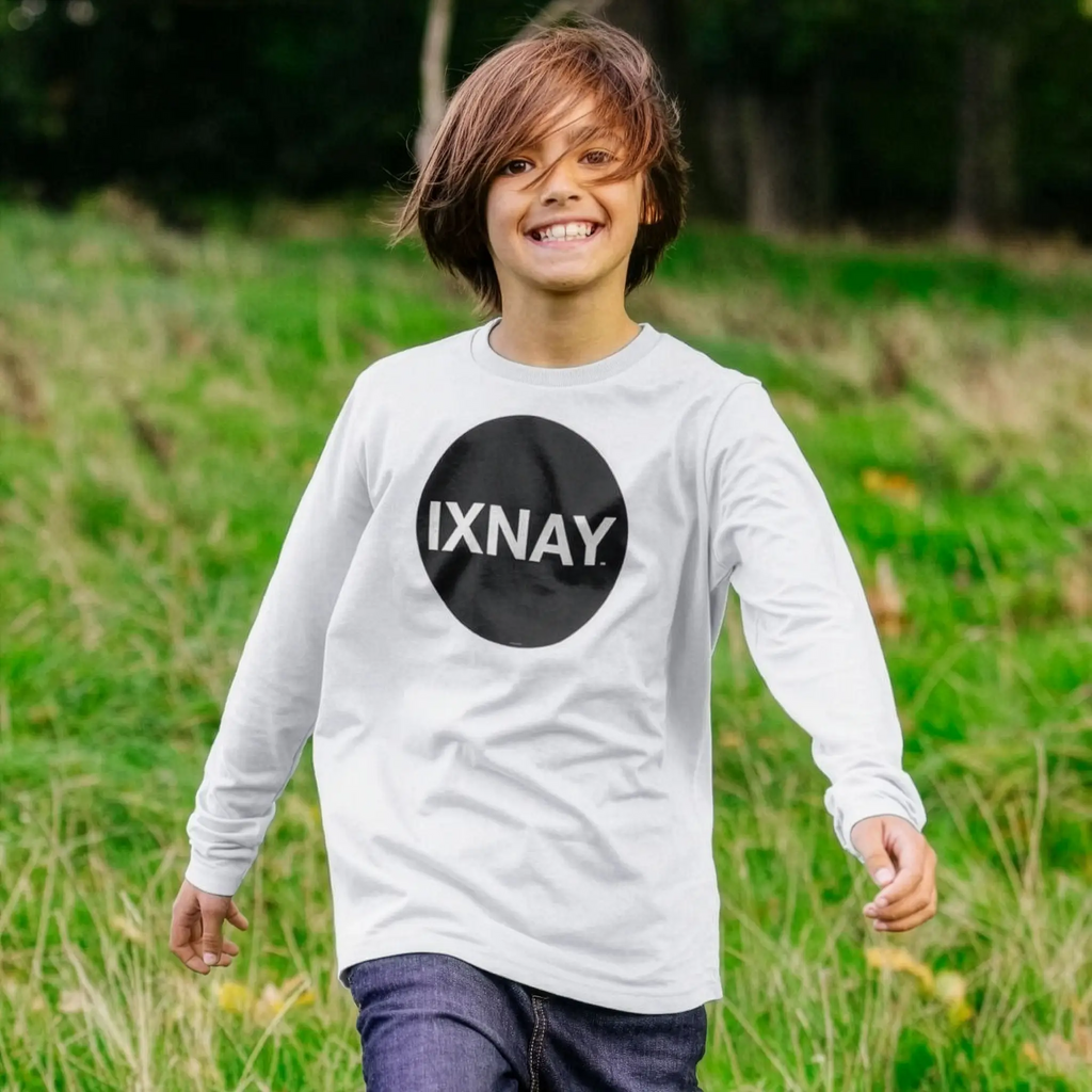 Kid plays wearing IXNAY Kids 100% Organic Cotton Long-Sleeve T-Shirt Original Logo -White.