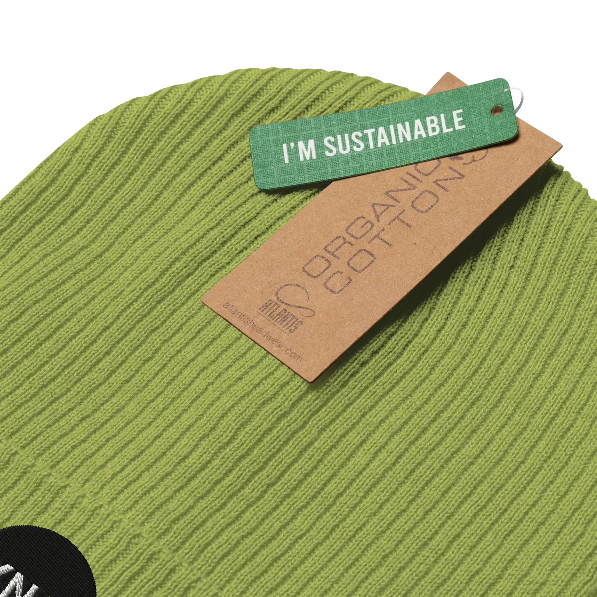 IXNAY Original Logo 100% organic ribbed beanie in leaf green sustainable certification tag detail view