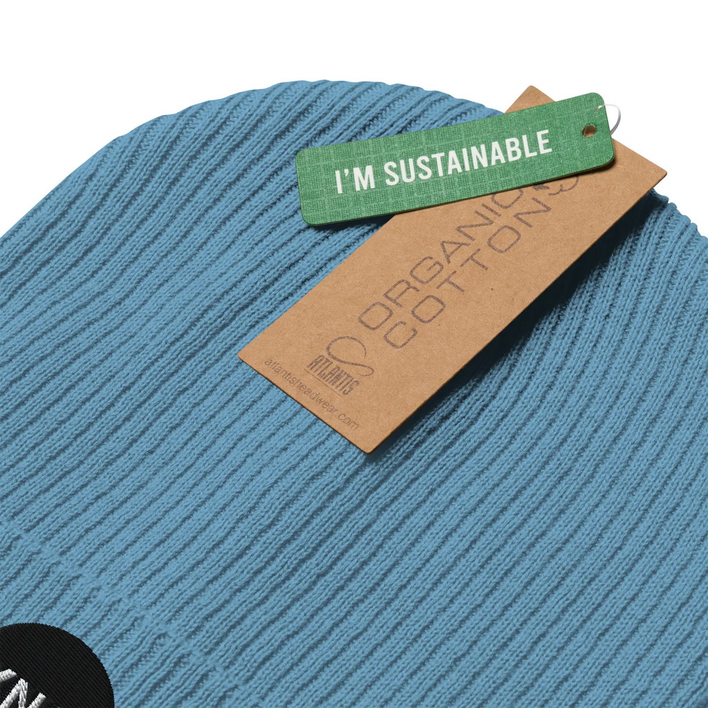 IXNAY Original Logo 100% organic ribbed beanie light blue sustainable certification tag detail view
