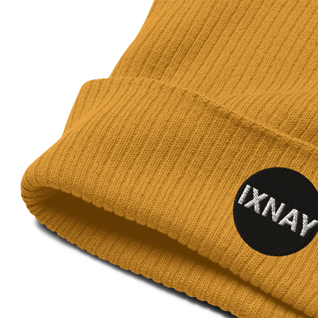 IXNAY Original Logo 100% organic ribbed beanie in mustard yellow product logo detail view