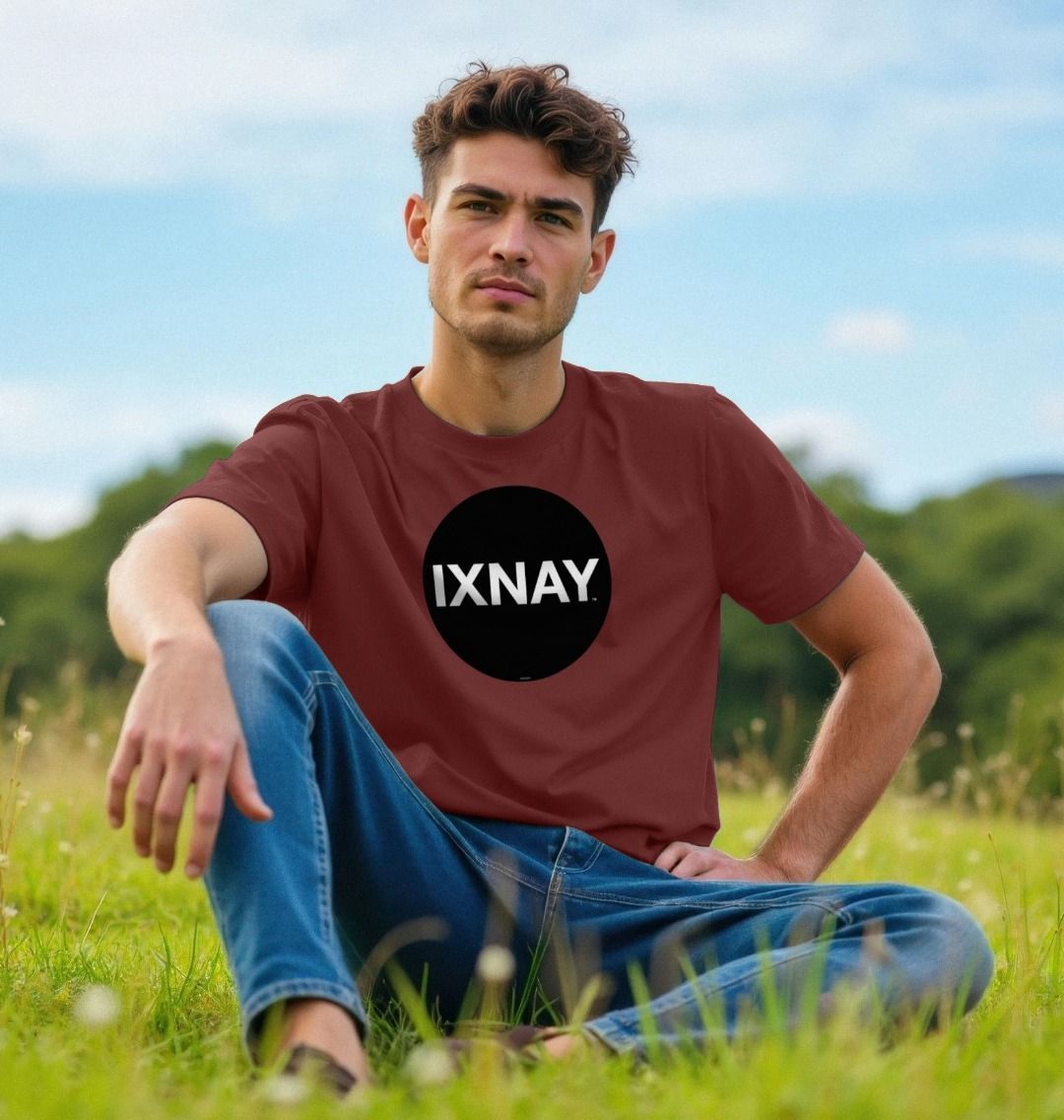 A man models a wine red t-shirt with a black circular logo that reads 'IXNAY' on the front.