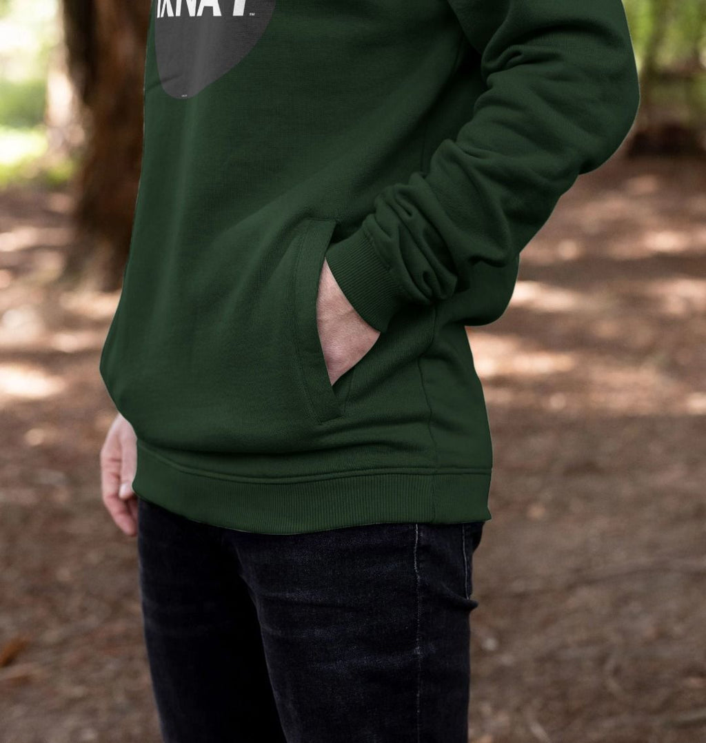 Man wearing mens dark green organic cotton pullover hoodie with original black round IXNAY logo showing side pocket details