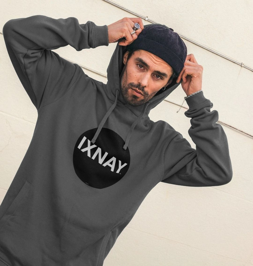 Man pulling up his hood while wearing mens dark slate gray organic cotton pullover hoodie with original black round IXNAY logo