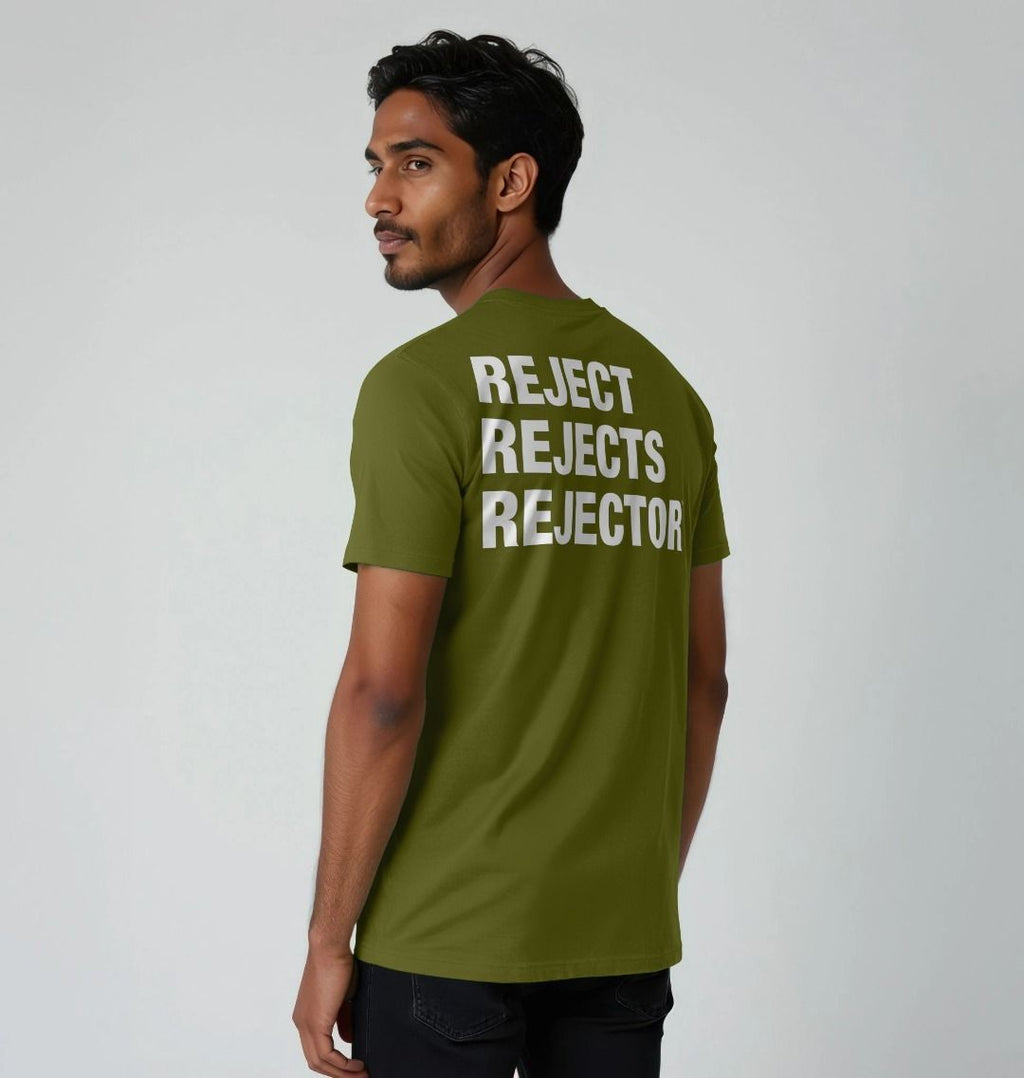 Man standing with his back to camera looking over his shoulder  wearing an moss green Printed Men's T-Shirt with Original Black Round IXNAY Logo with the phrase REJECT REJECTS REJECTOR on back  to represent the artist and musician IXNAY