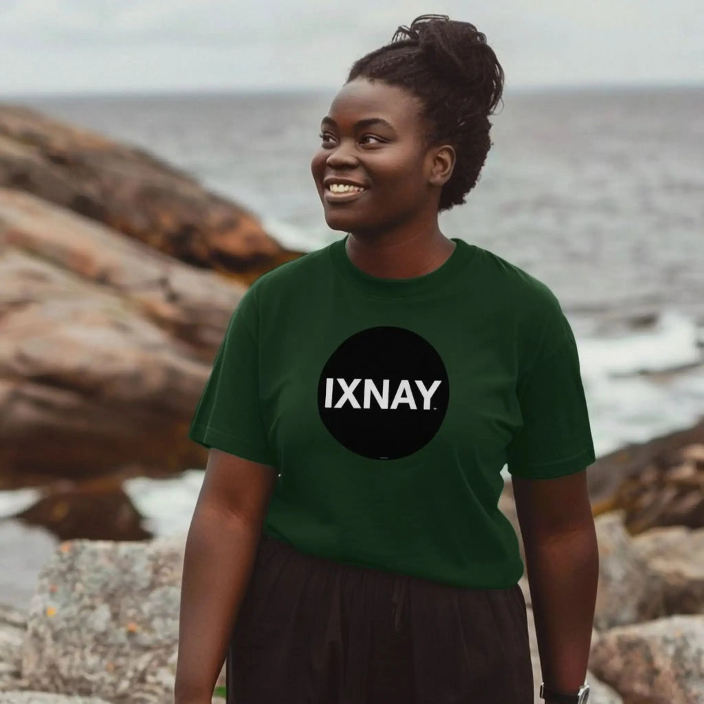 Woman wearing women's short-sleeve dark green t-shirt with 'IXNAY' original black circle logo in 100% organic cotton.