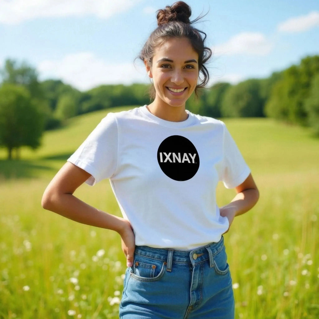 Woman wearing women's short-sleeve white t-shirt with 'IXNAY' original black circle logo in 100% organic cotton.
