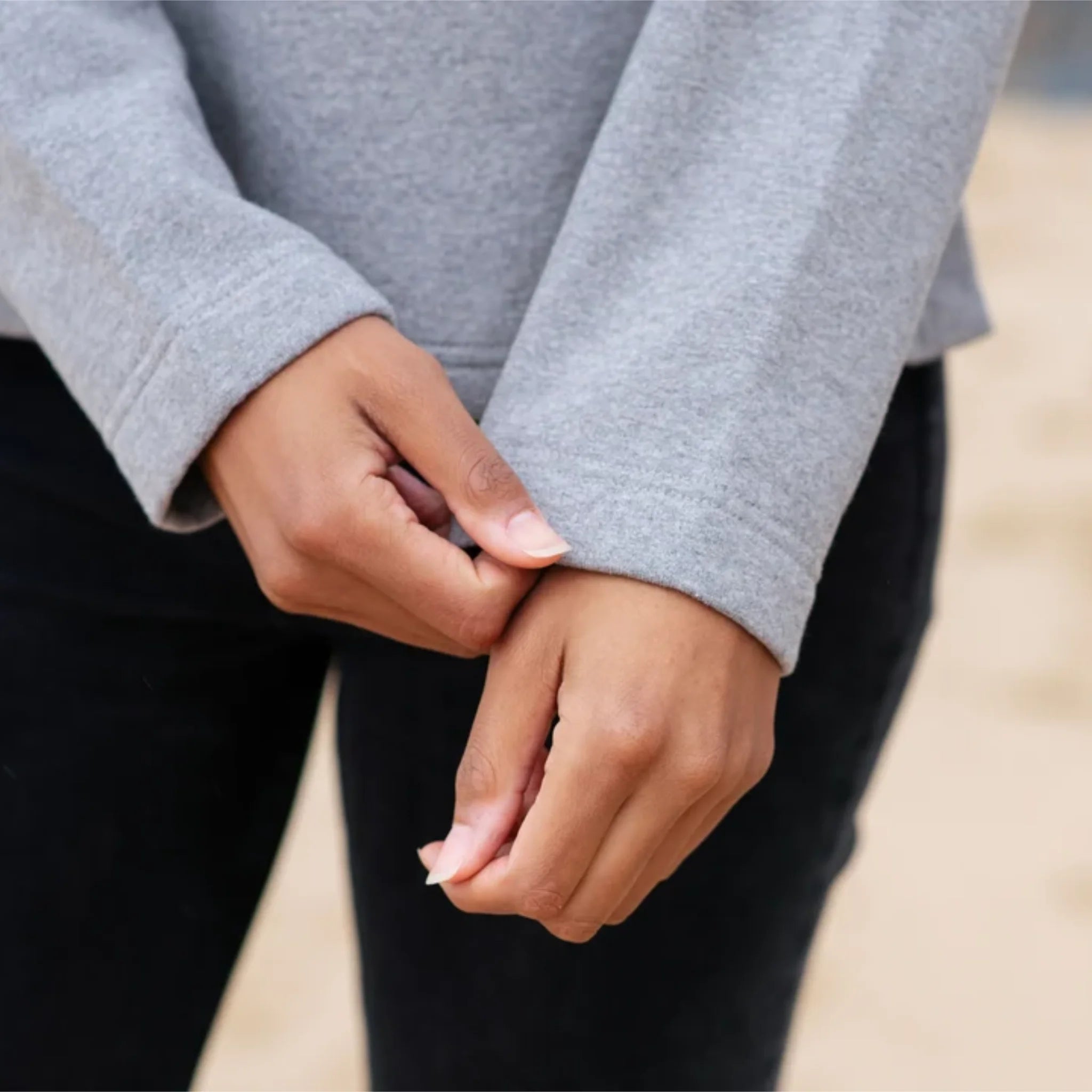 Detail shot of straight/barrel cuff as found on IXNAY Women's pullover hoodie.
